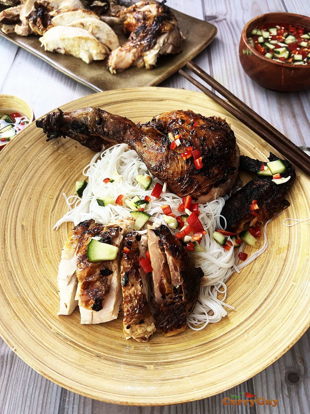 Vietnames chicken served with nuoc cham on rice vermicelli noodles.