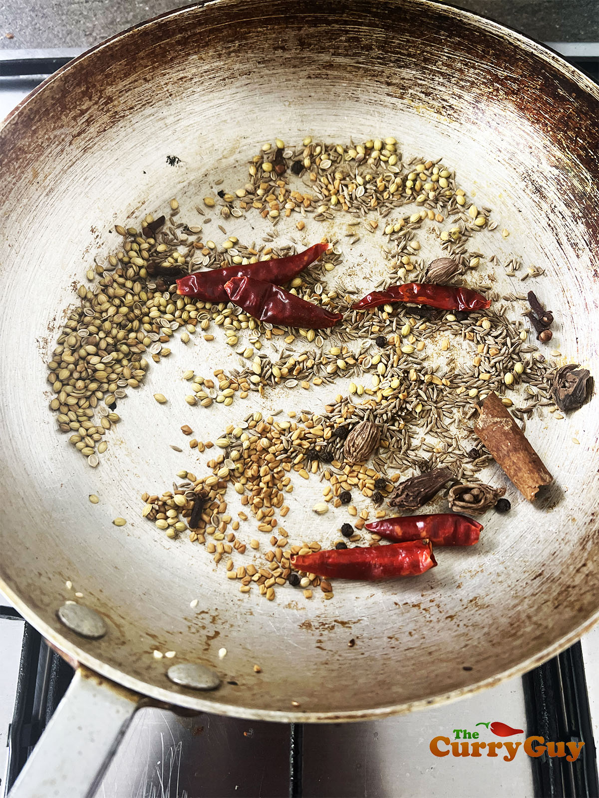 Toasting the spices for the vindaloo marinade.