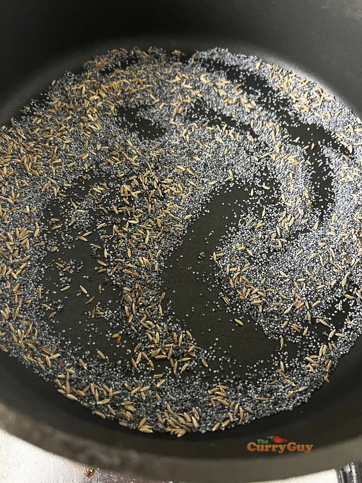 Toasting poppy seeds and cumin seeds