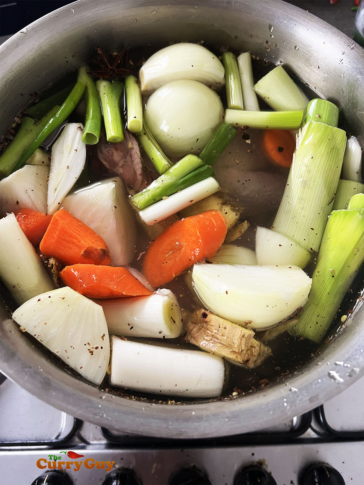 Stock ingredients in a pot.