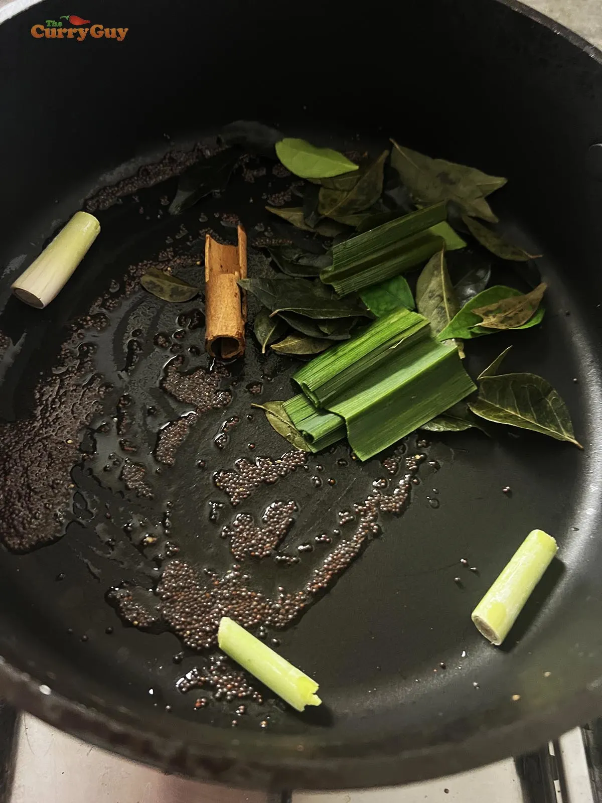 Infusing herbs and spices into hot oil.