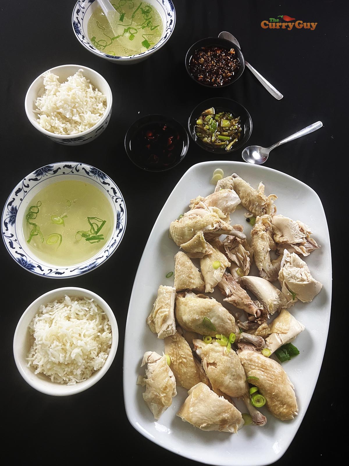 Hainan Chicken served with rice, chicken broth and dipping sauce.