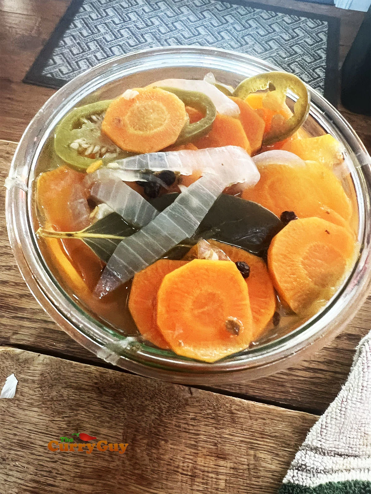 The carrot mixture in a pickling jar.