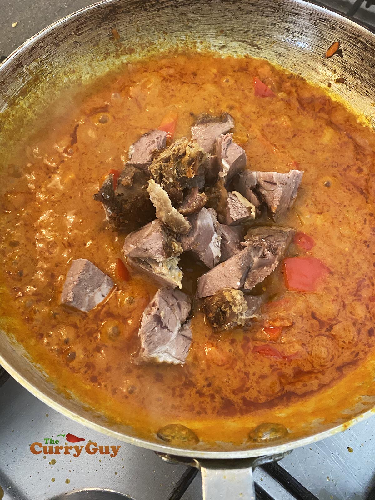 pre-cooked lamb added to the pan