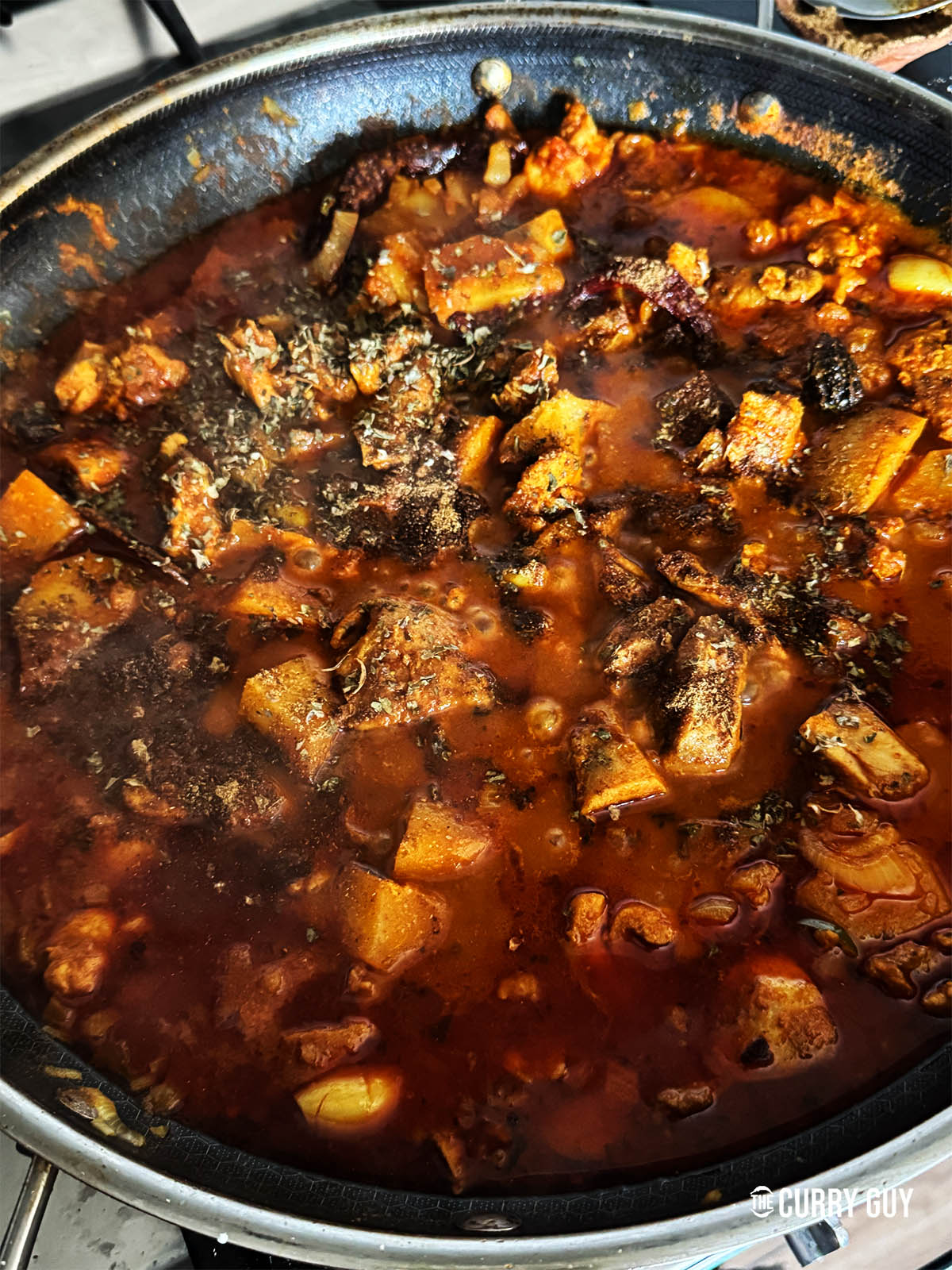Adding the kasoori methi, garam masala and salt to taste just before serving.