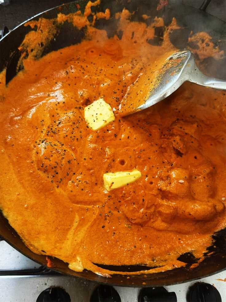 Butter melting into butter chicken curry.