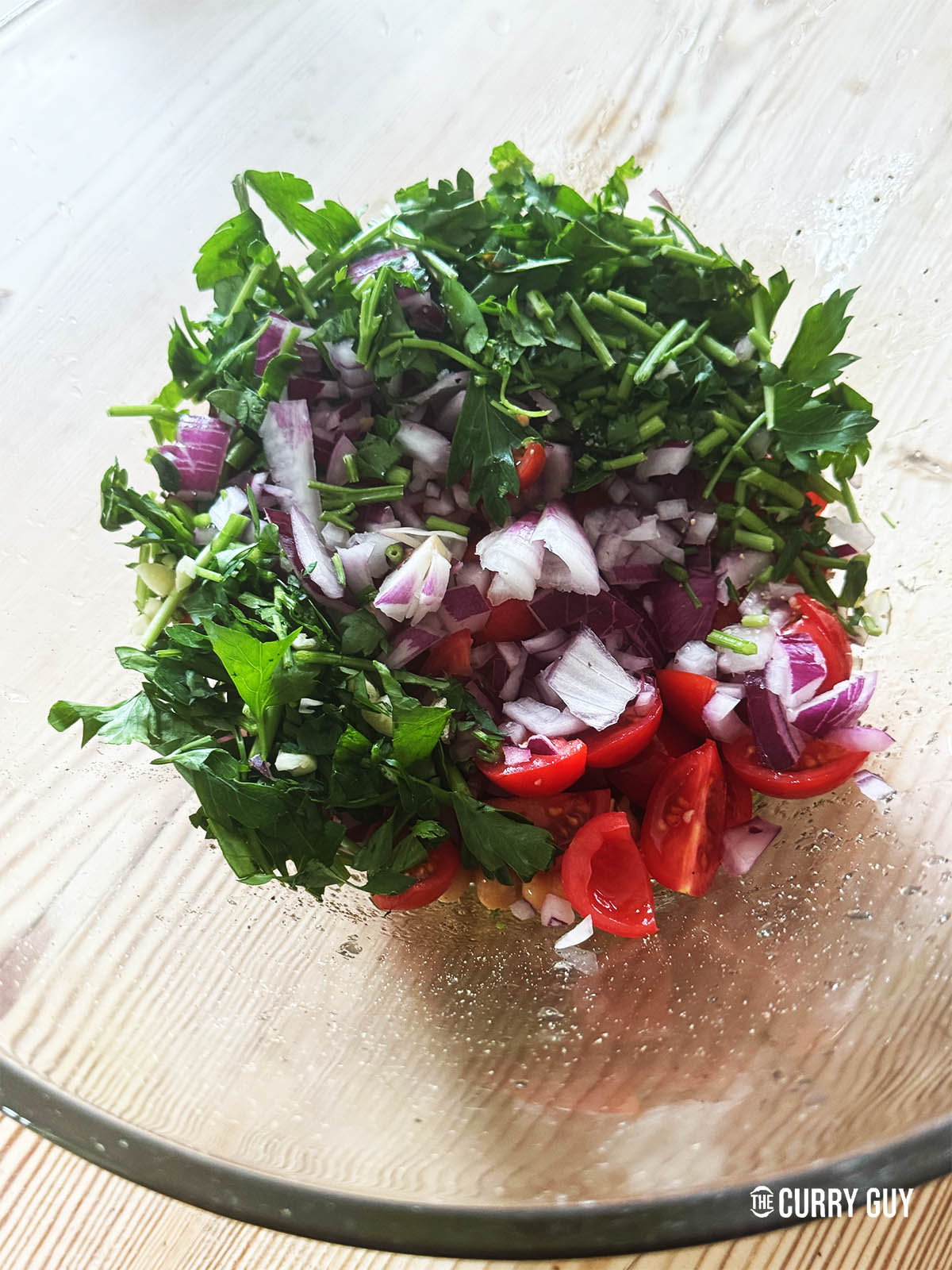 The chopped dry ingredients in a bowl