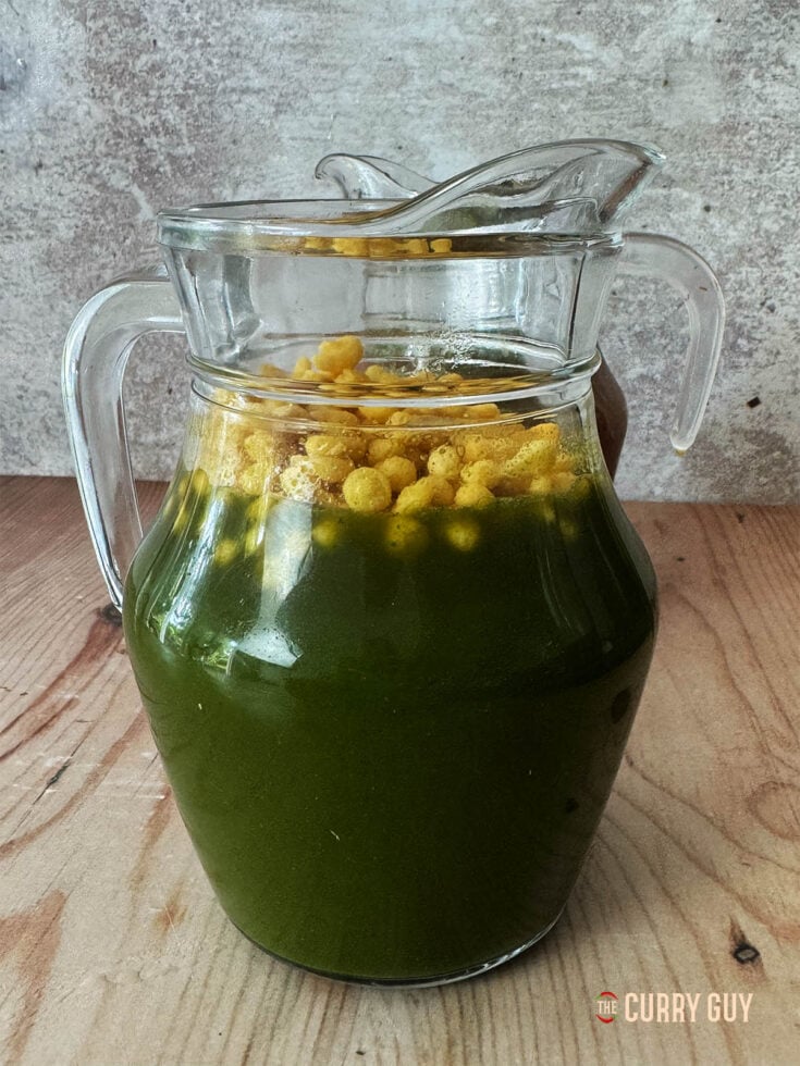 Green pani in a pouring jug.