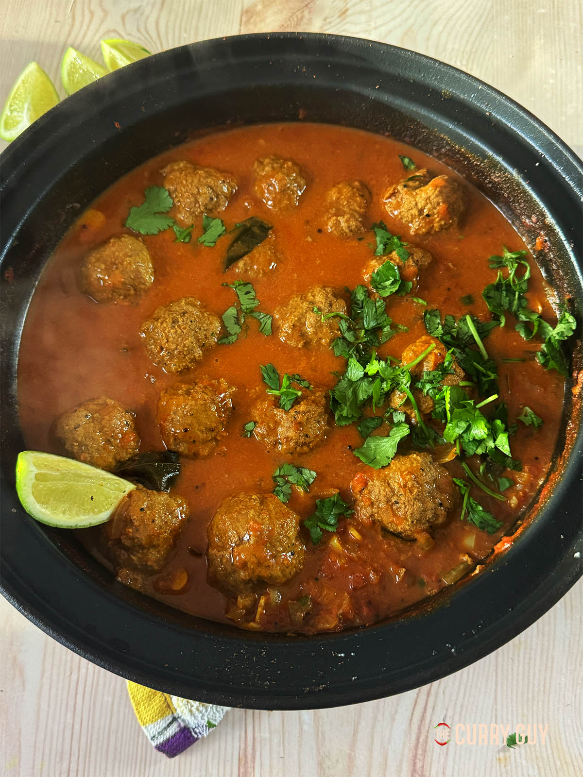 Goan beef kofta curry in a serving bowl.