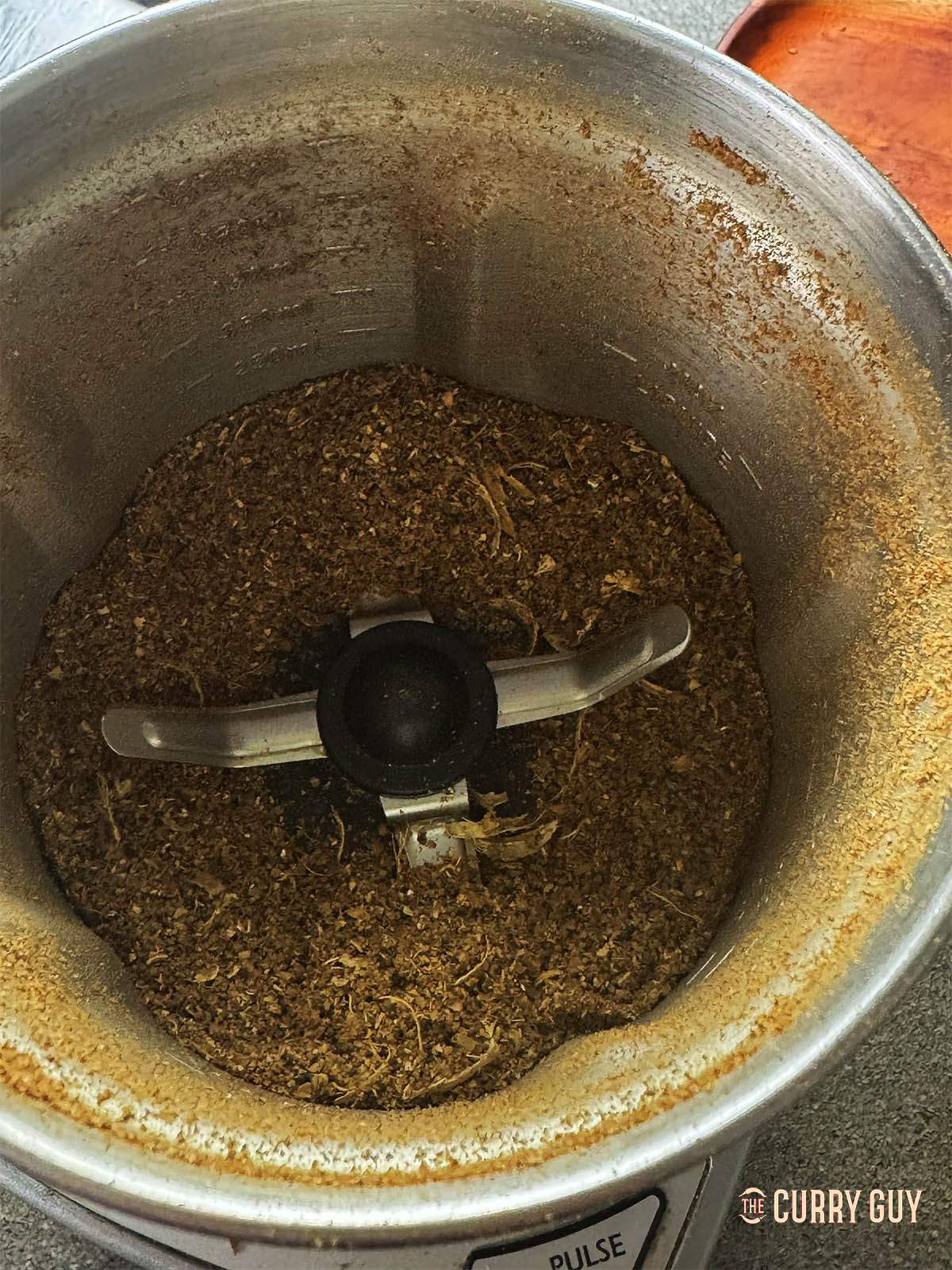 The ground spices with turmeric ready to add to the curry.