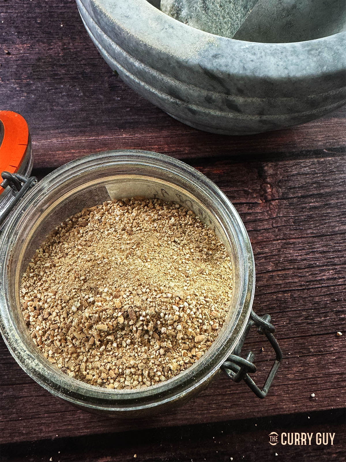 Storing the khao khua in a glass jar.