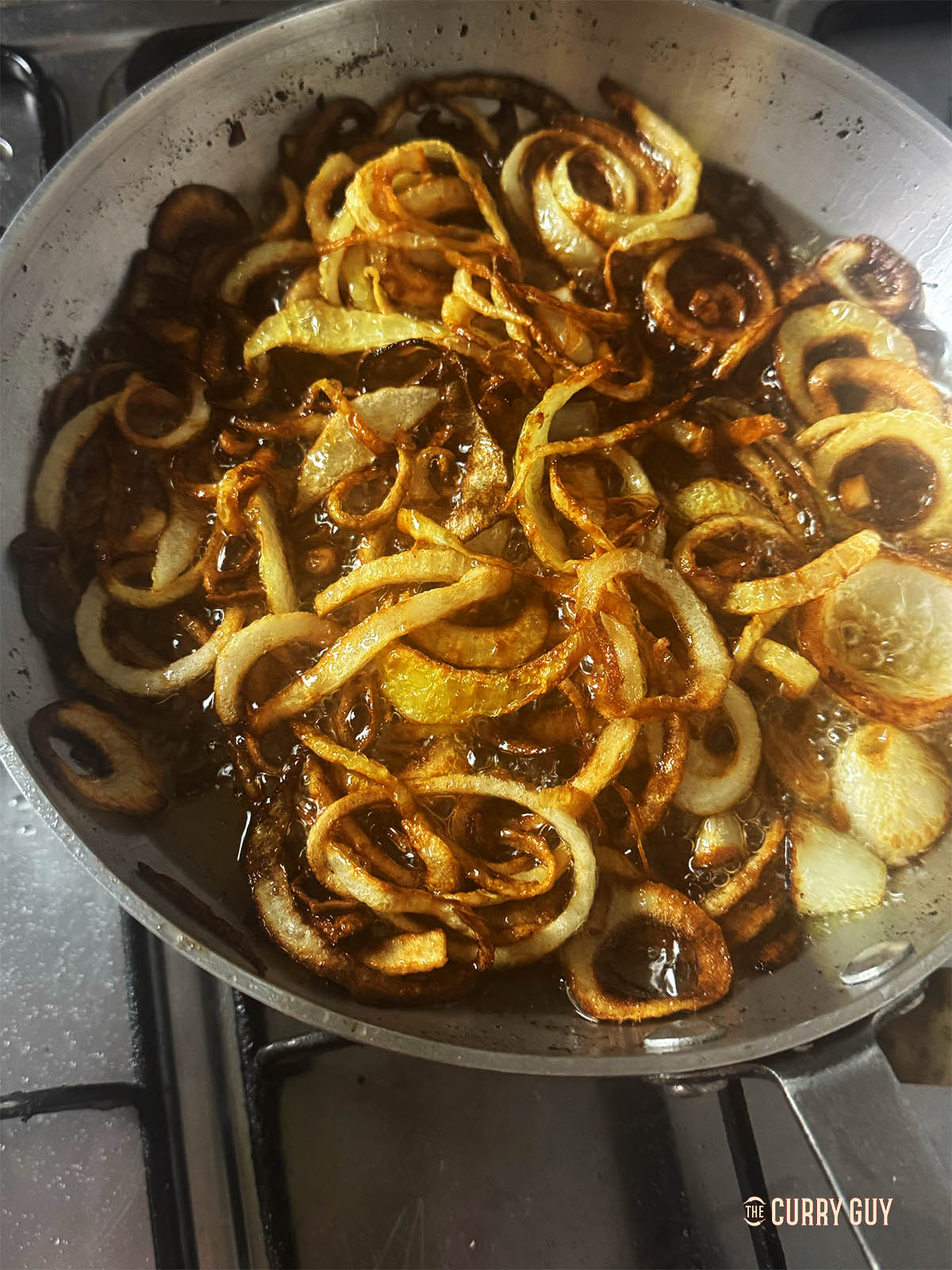 Onions frying in oil.