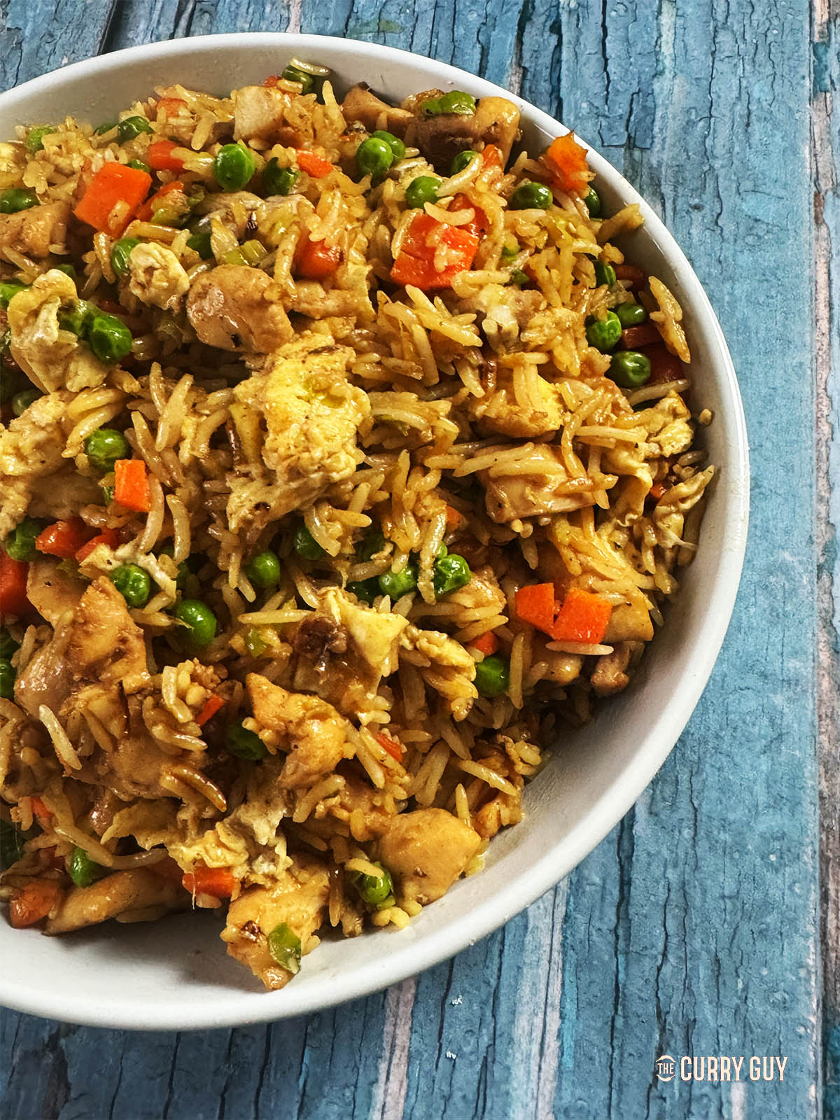 Chicken fried rice in a serving bowl.