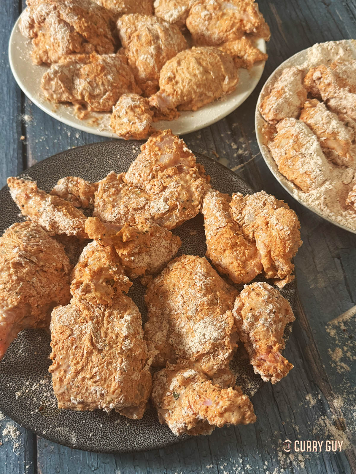 Letting the flour coated chicken rest before frying.