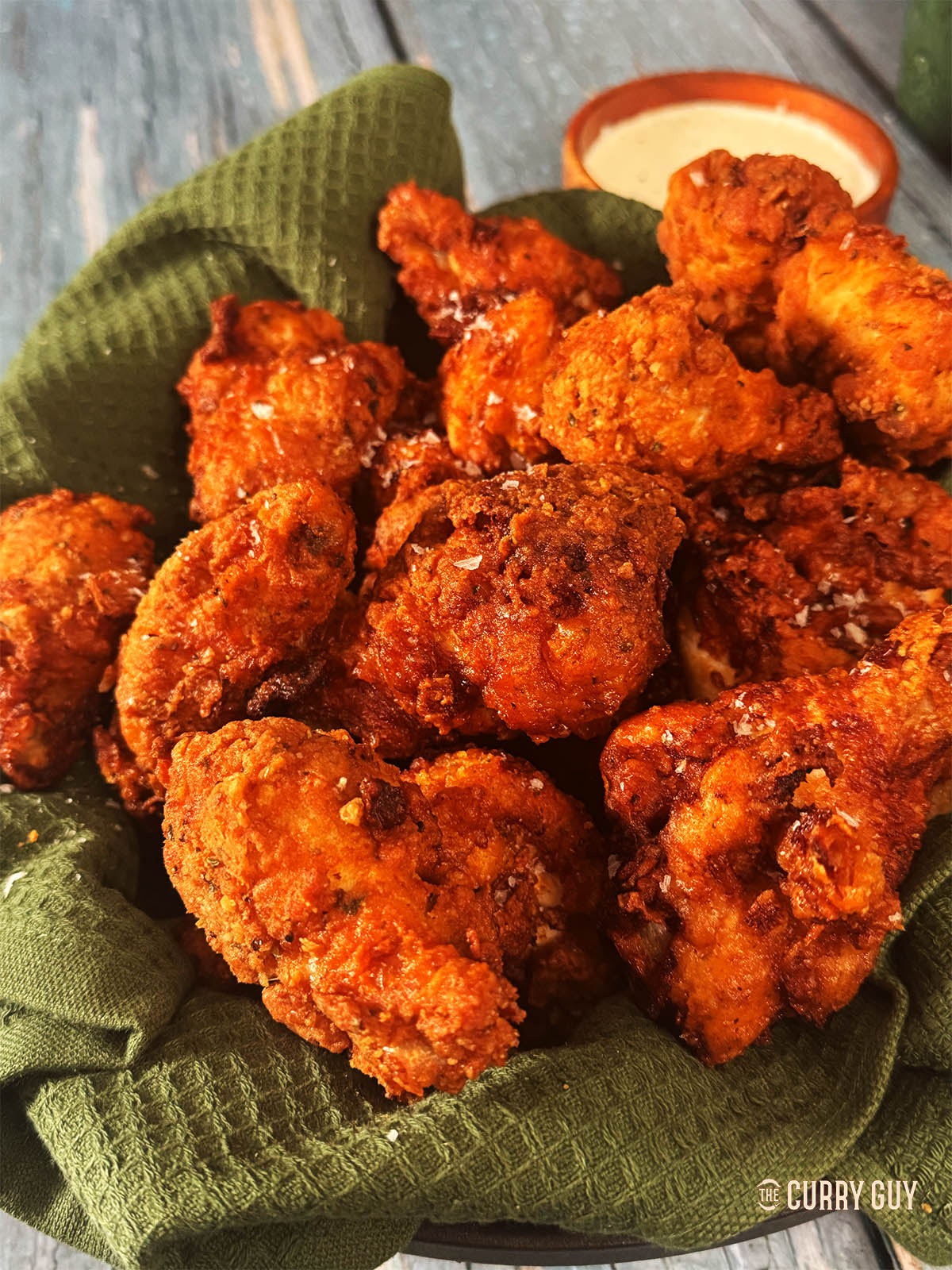 Serving hot from the oil, sprinkled with more flaking salt