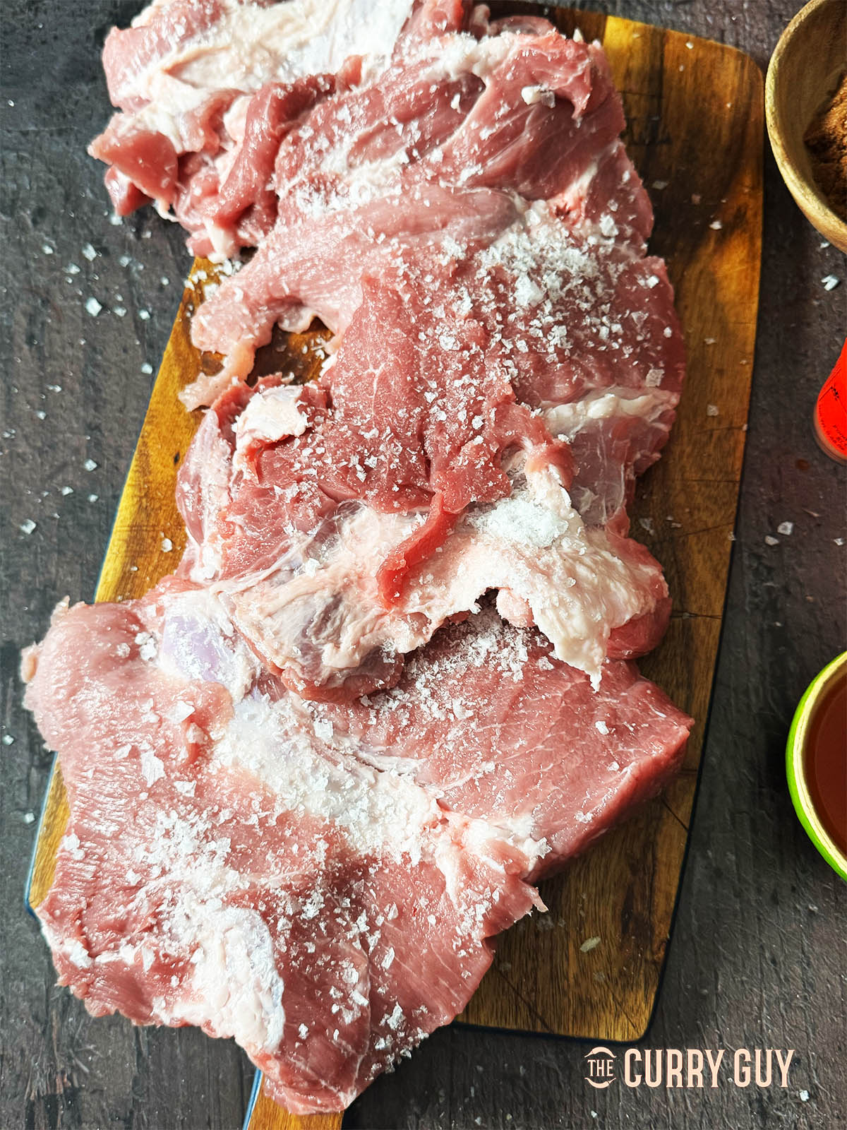 The thinly sliced pork shoulder ready for marinating. 