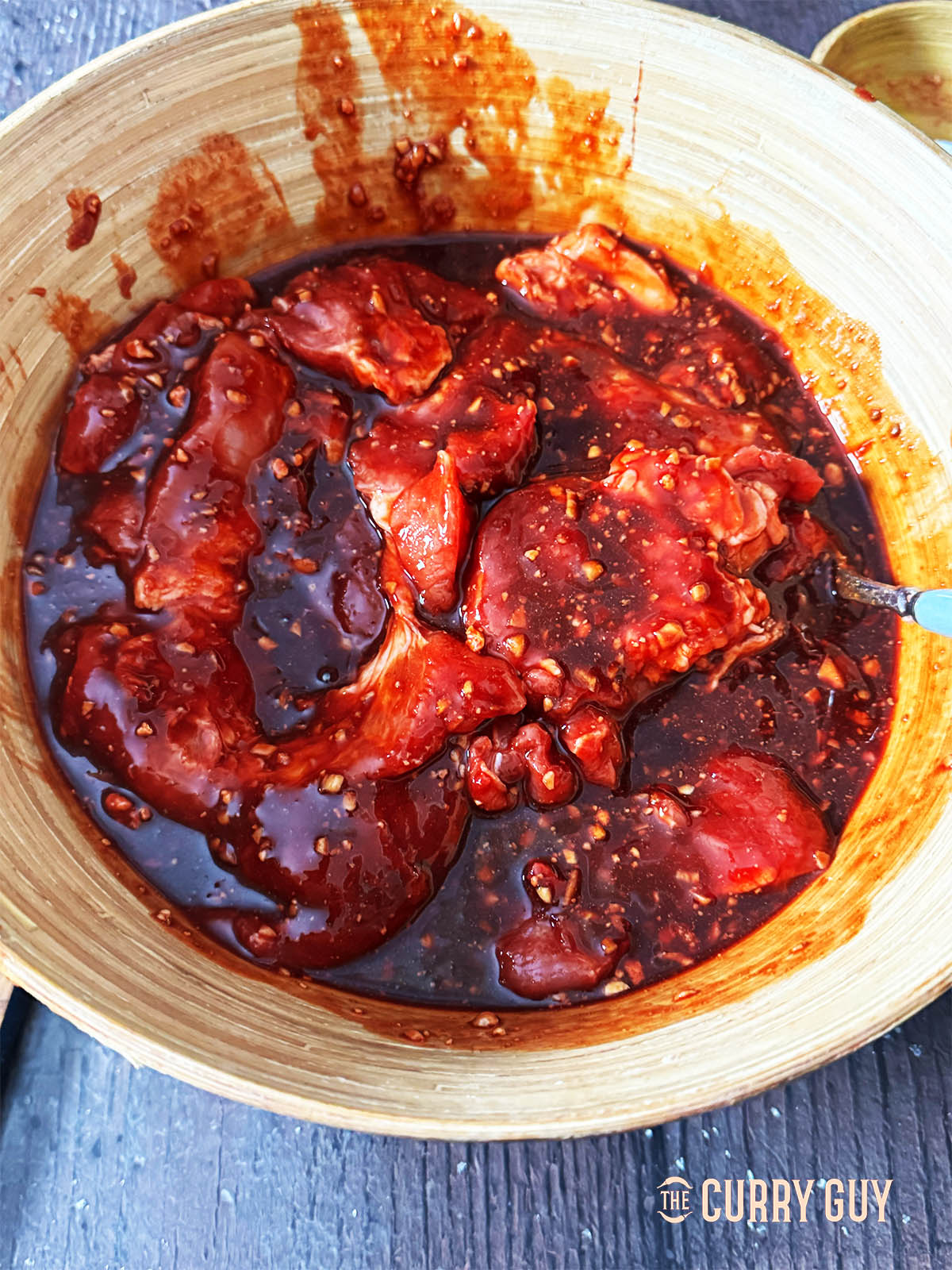 The pork marinating in the char siu marinade.