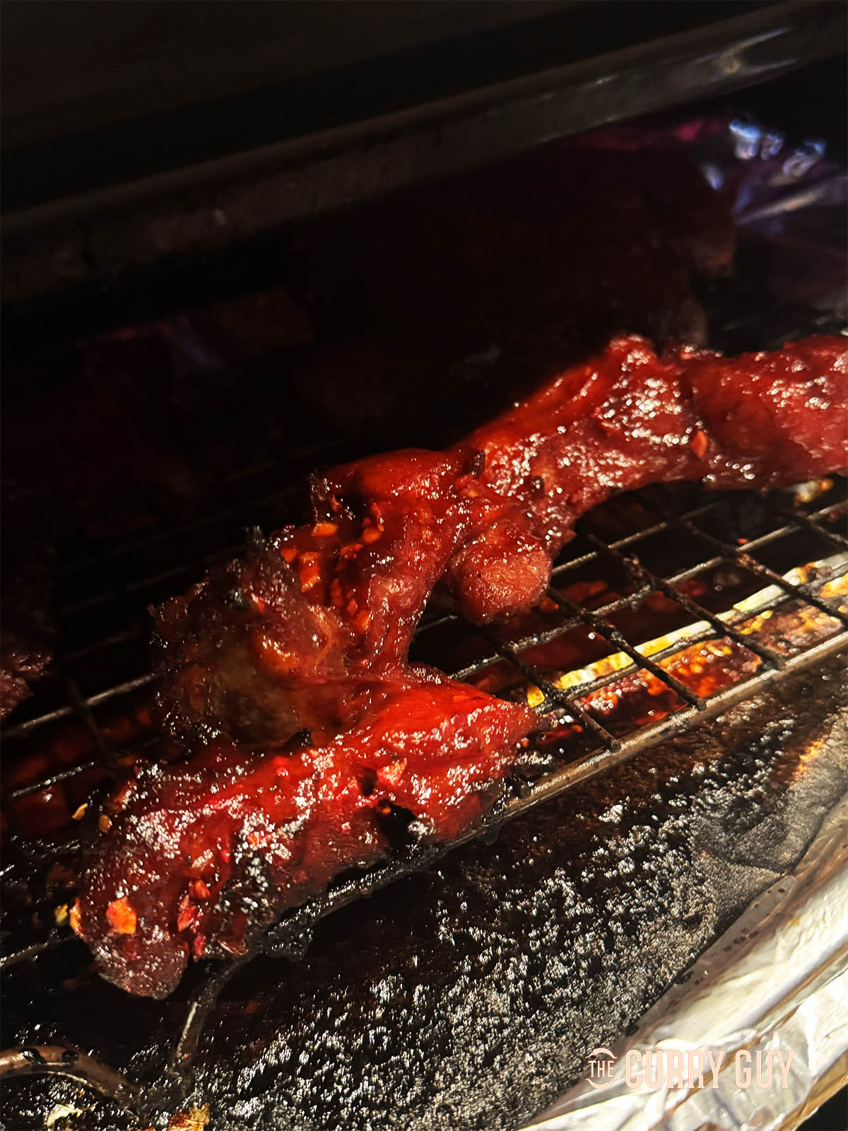 Roasting the char siu in the oven.