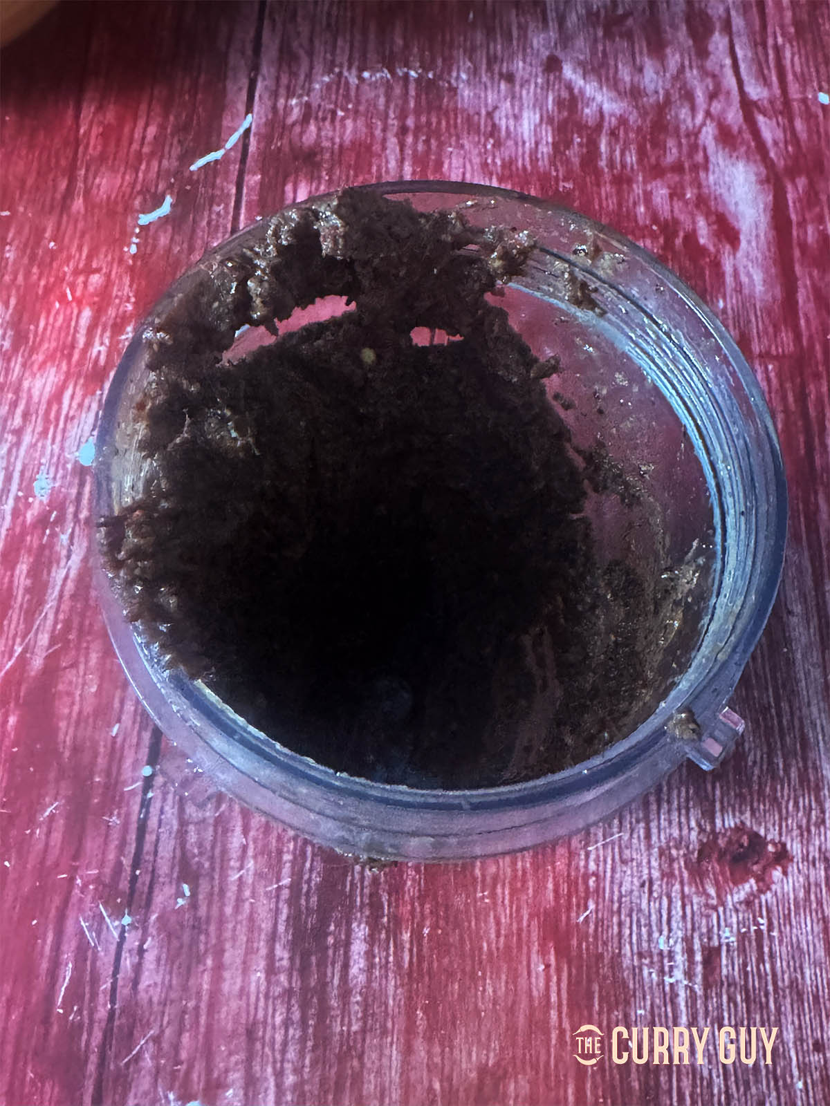 The blended black paste made from the toasted sesame seeds, spices and fried onions.