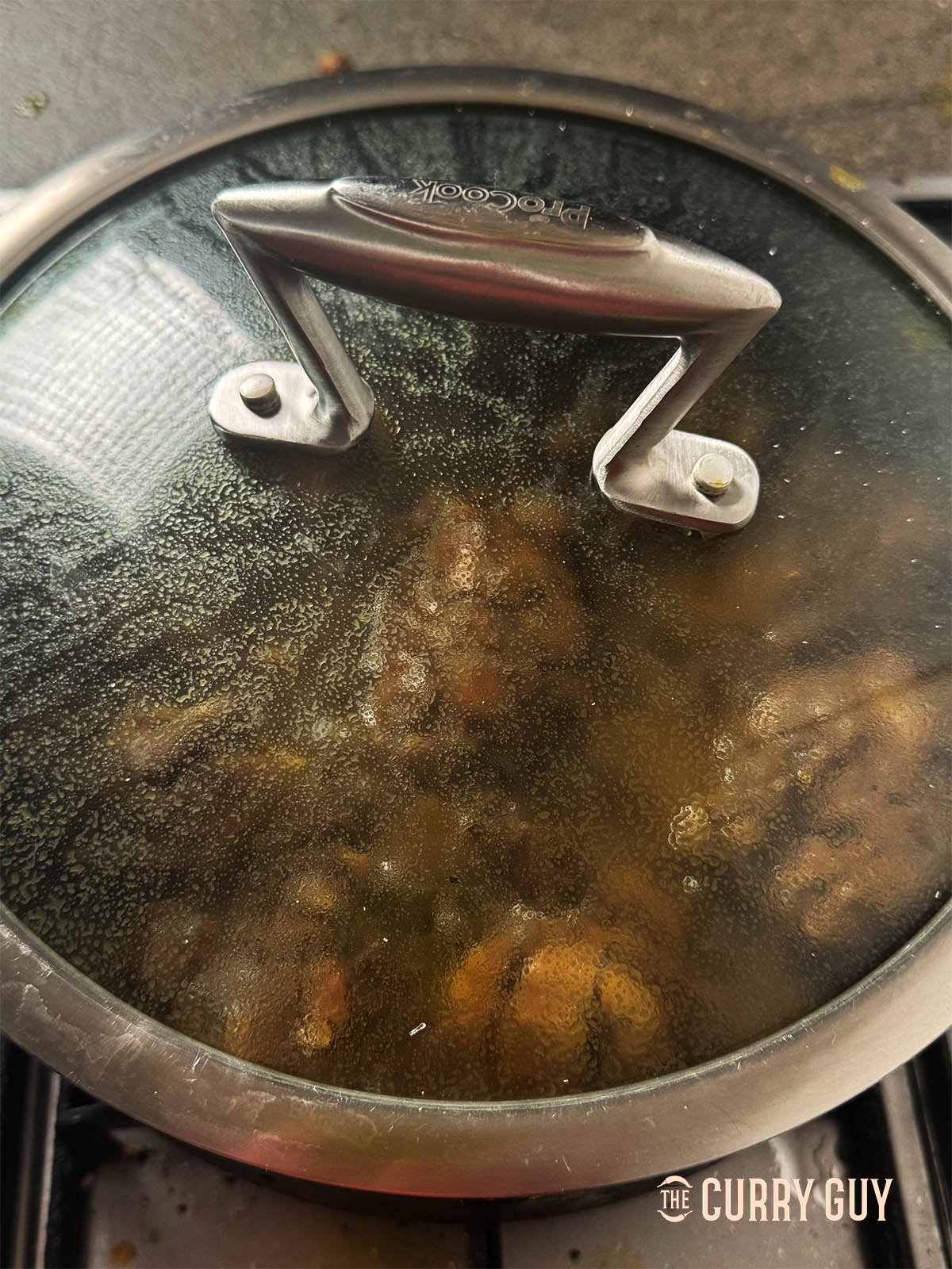 Cooking the Black chicken curry covered for 35 minutes