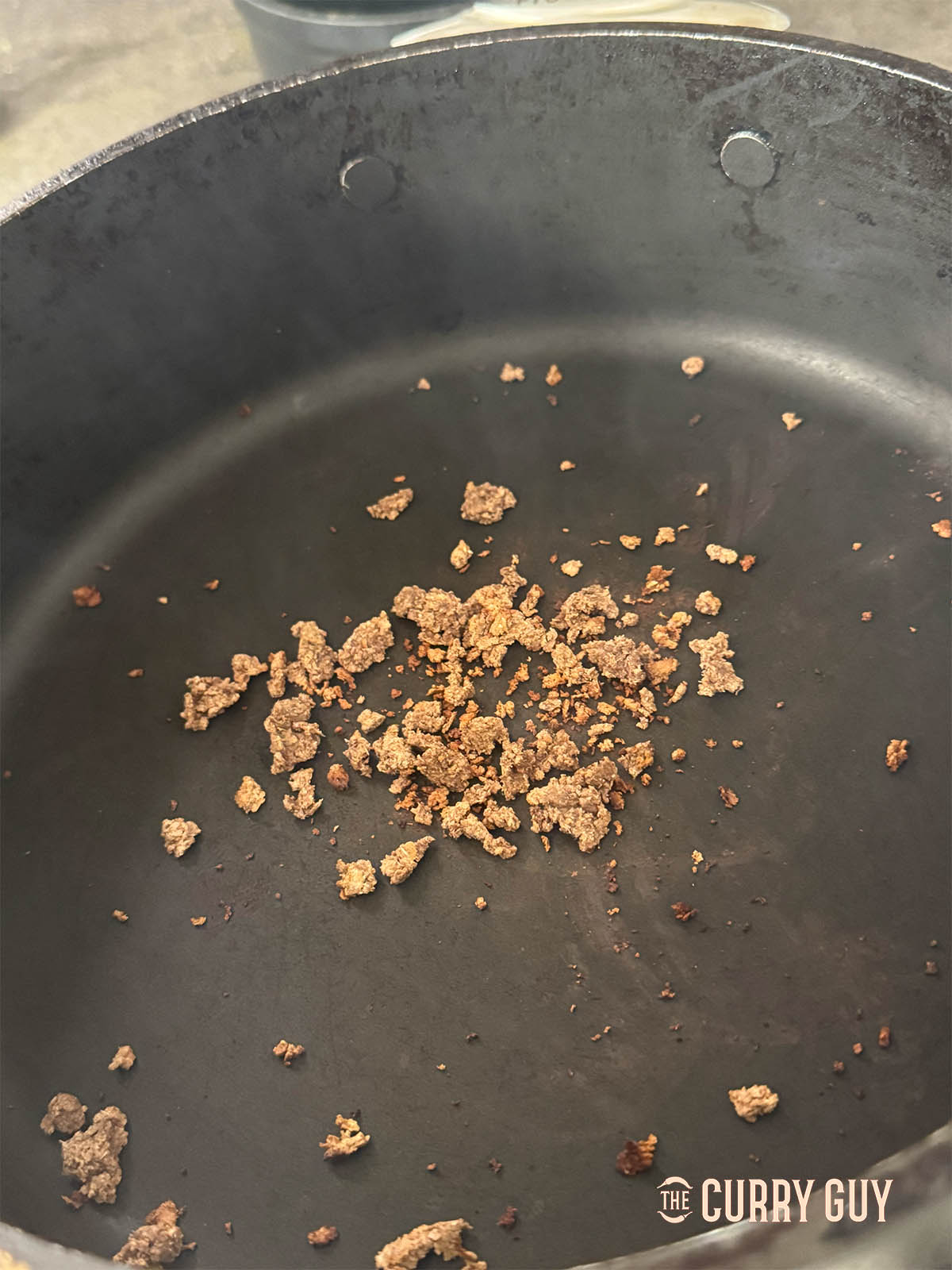 Crumbly shrimp paste after being dry fried.