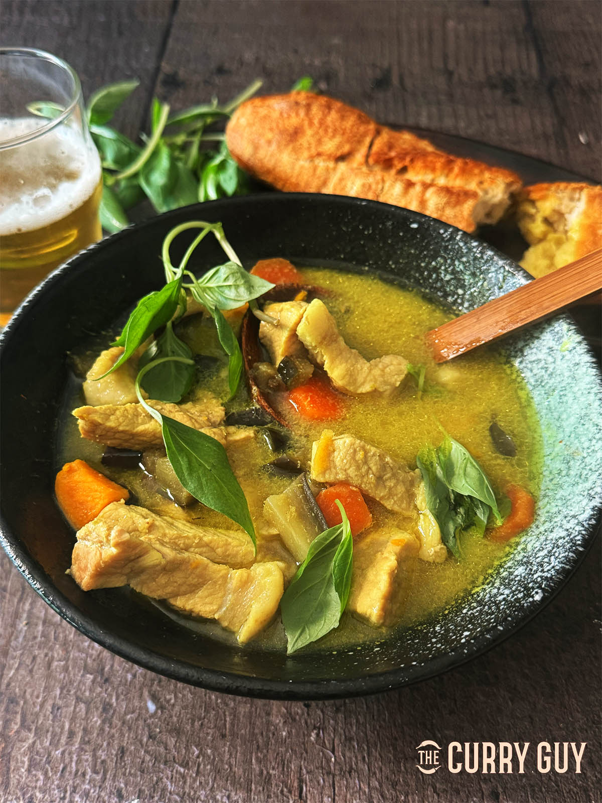 Stirring in the basil and also garnishing with the basil.