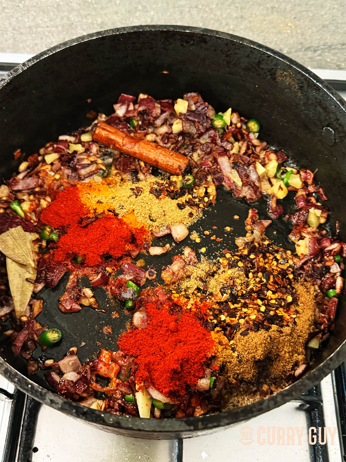 Stirring in the ground spices.
