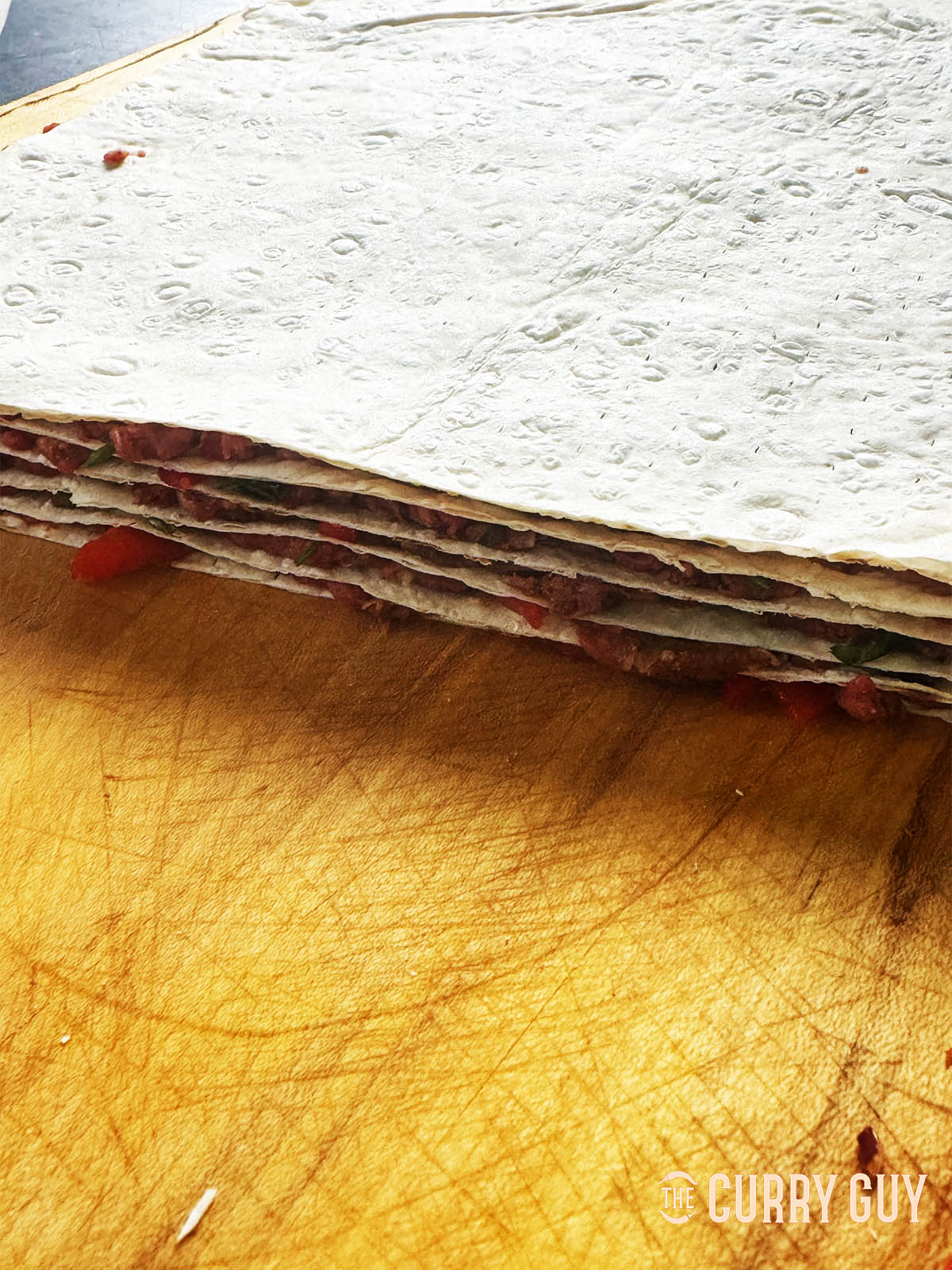 The stacked lavash and meat ready for the fridge to cool.