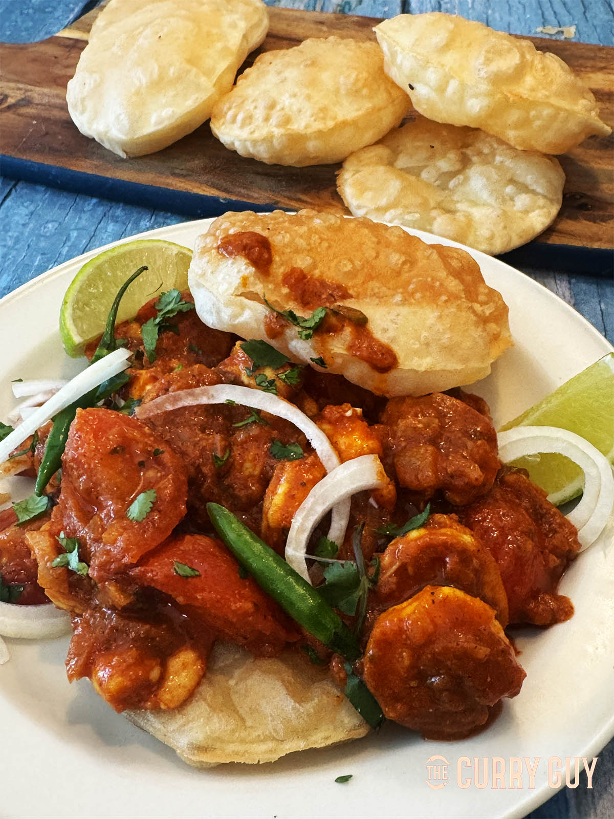Prawn puri on a serving plate.