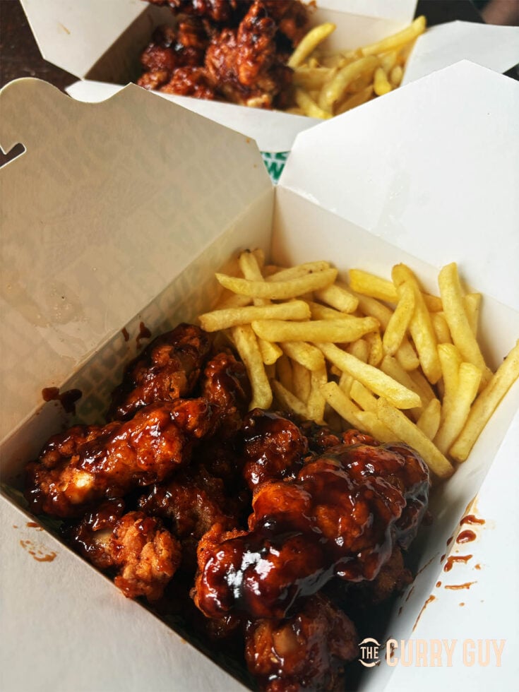 Boneless Chicken Wings covered in BBQ Sauce.