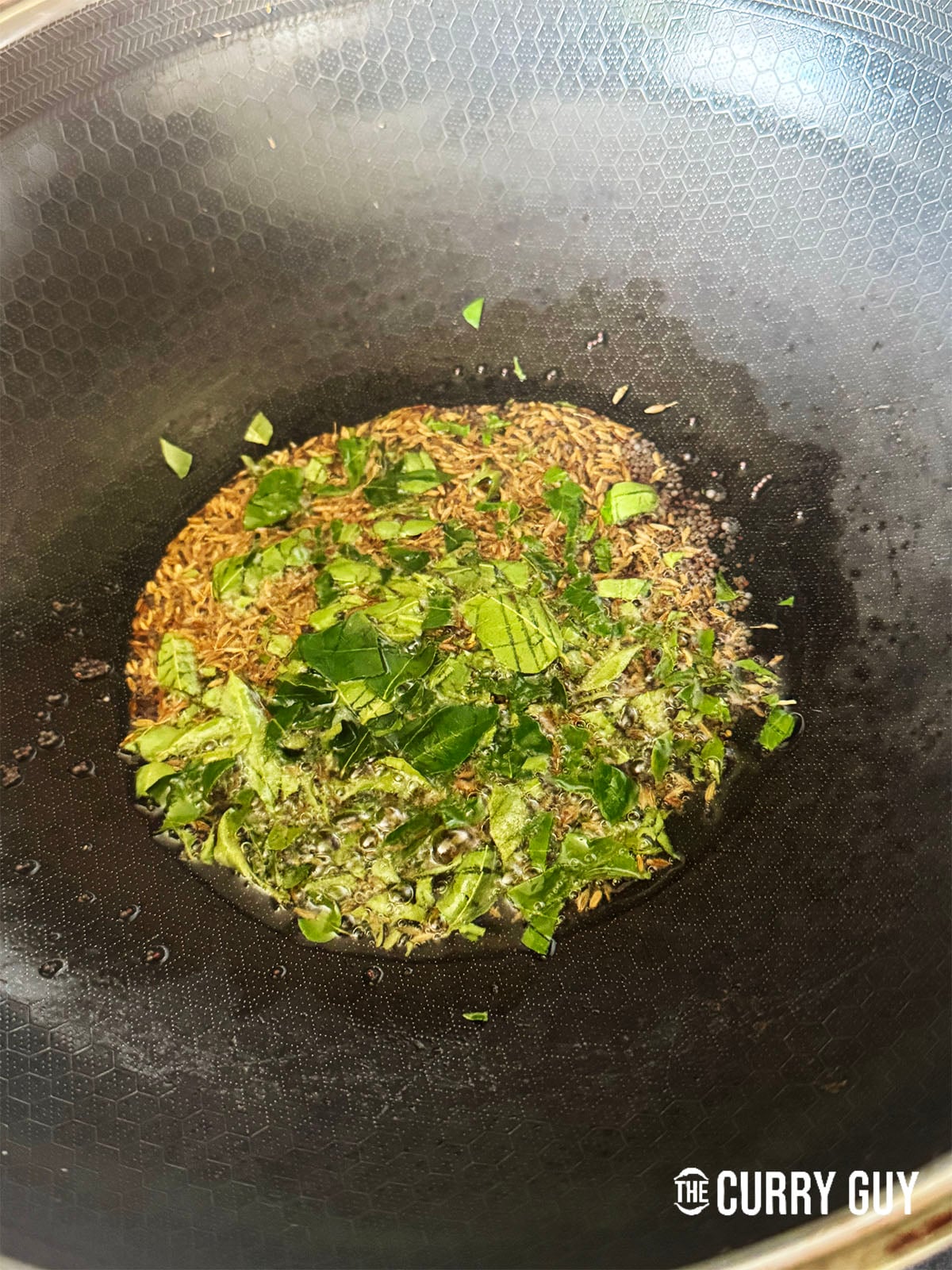 frying the fragrent spices