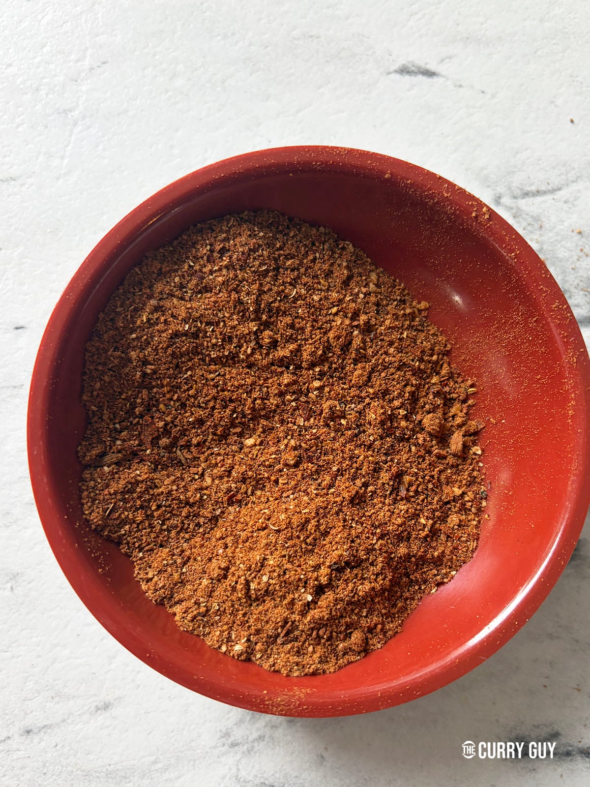 Making the chicken angara spice blend