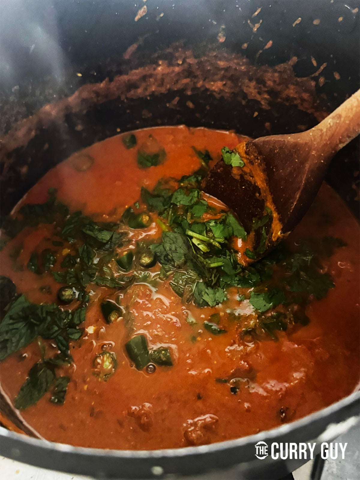 stirring in the coriander