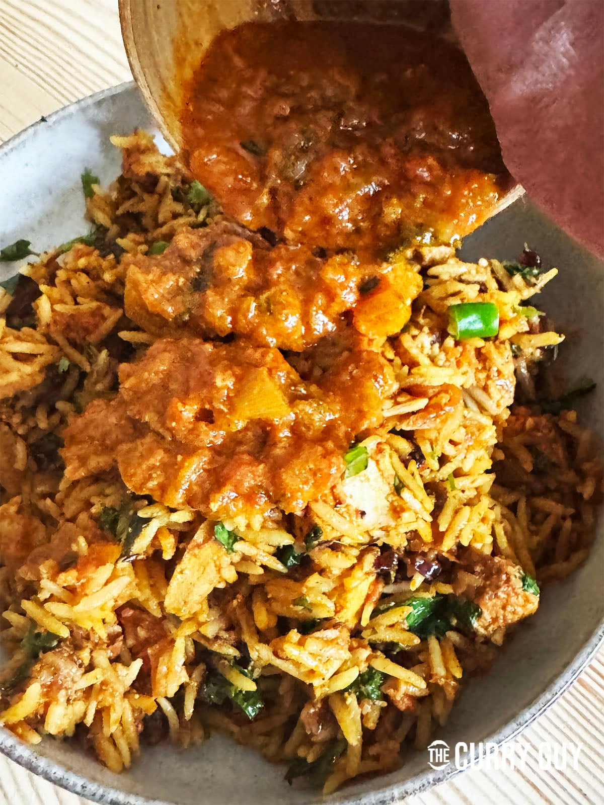 serving up the chicken tikka biryani