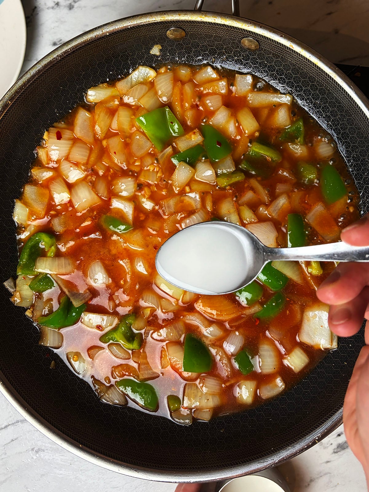 Adding the sauce ingredients 